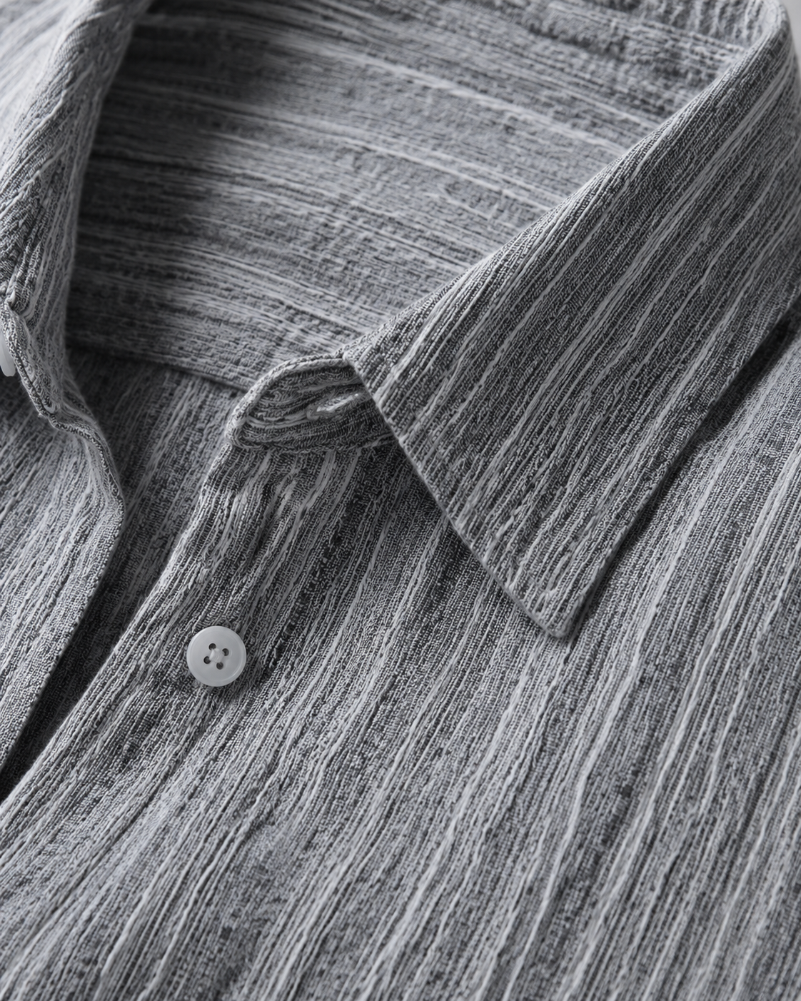 Close-up of spread collar and slub stripe texture