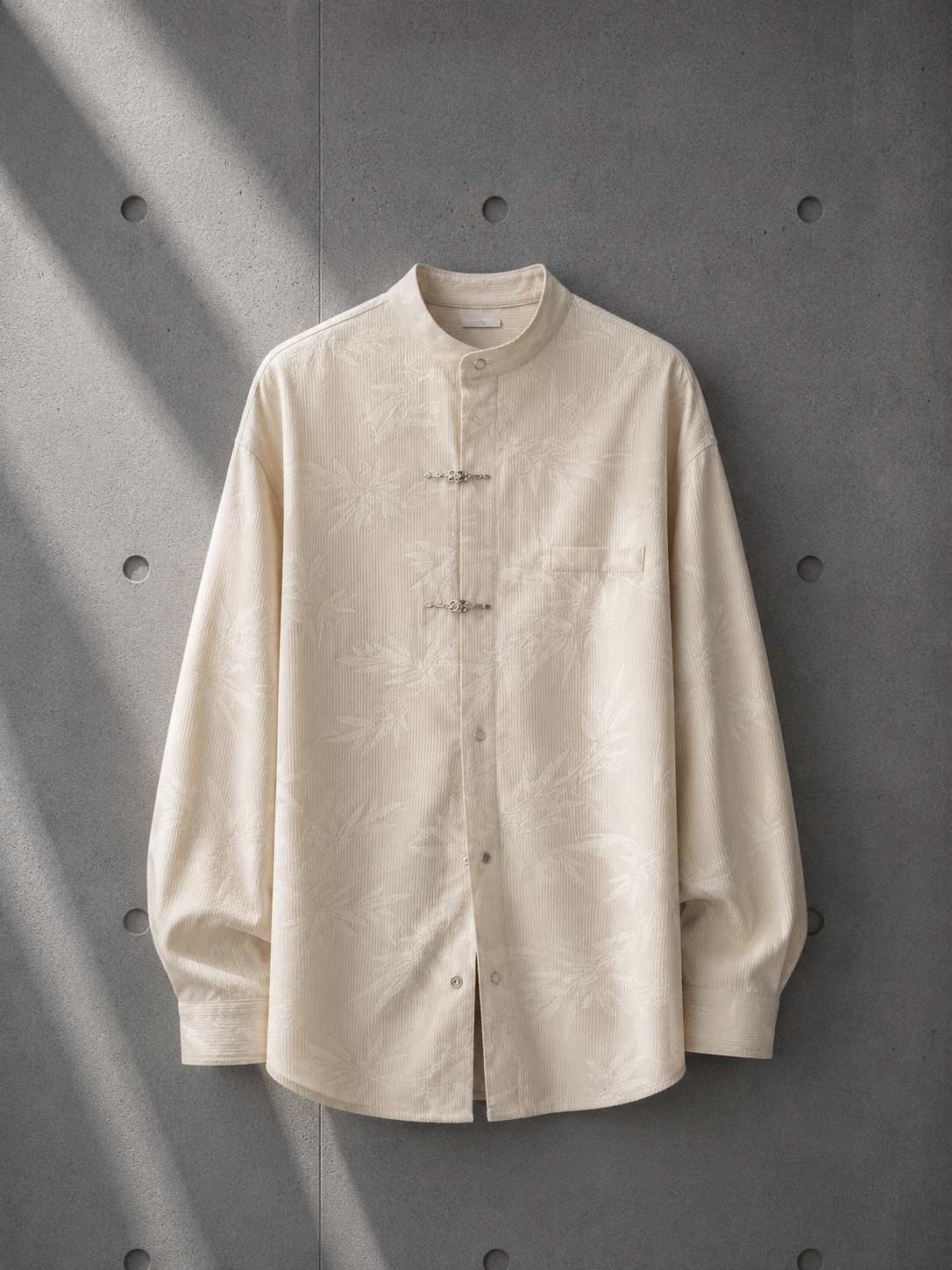 Beige shirt on a gray textured background