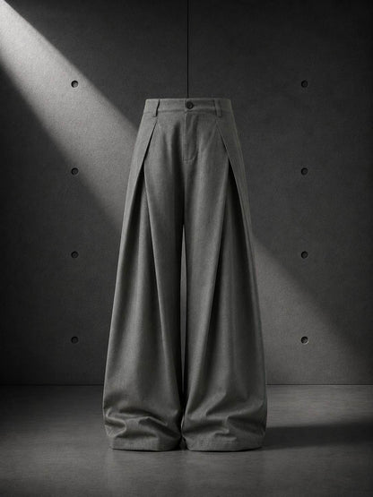 Green wide-leg pants on a dark background