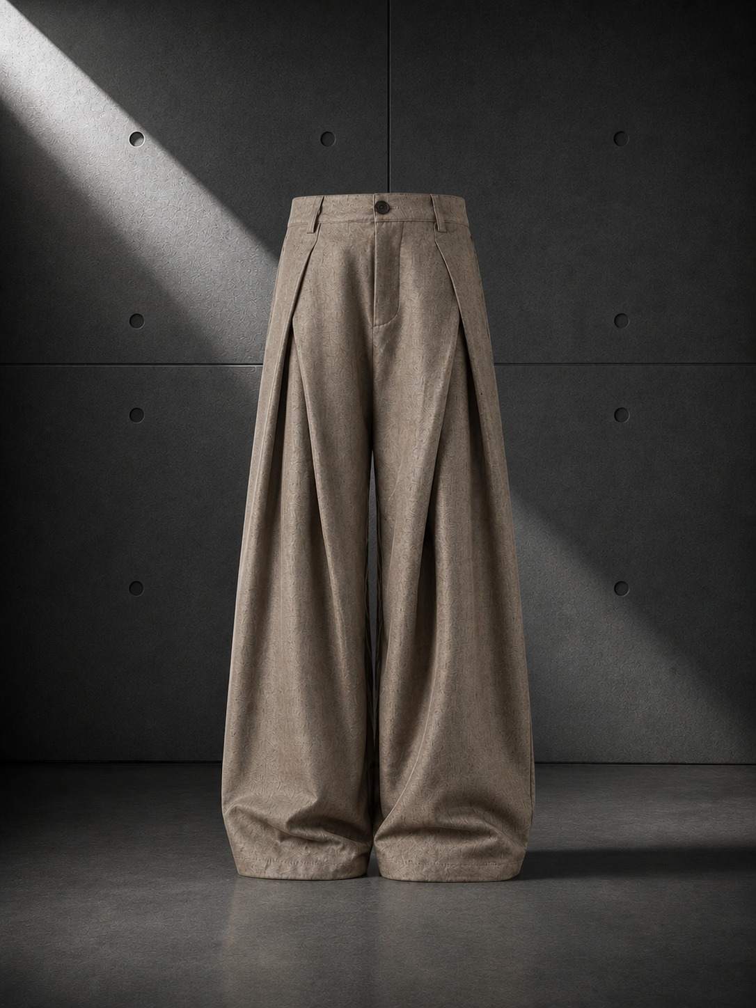 Brown wide-leg pants on a dark background