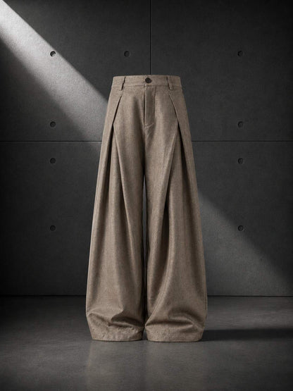 Brown wide-leg pants on a dark background