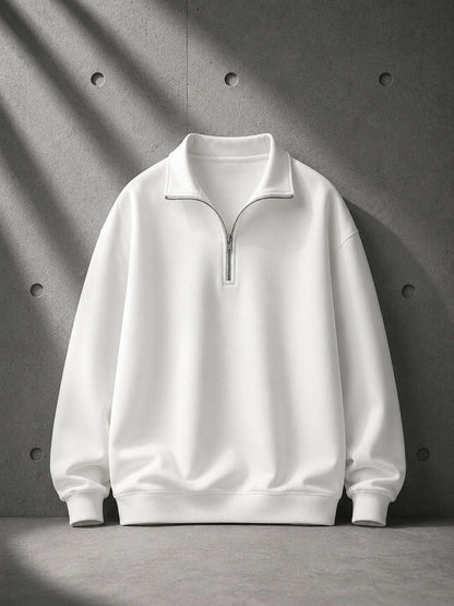 White half-zip sweatshirt on a gray background