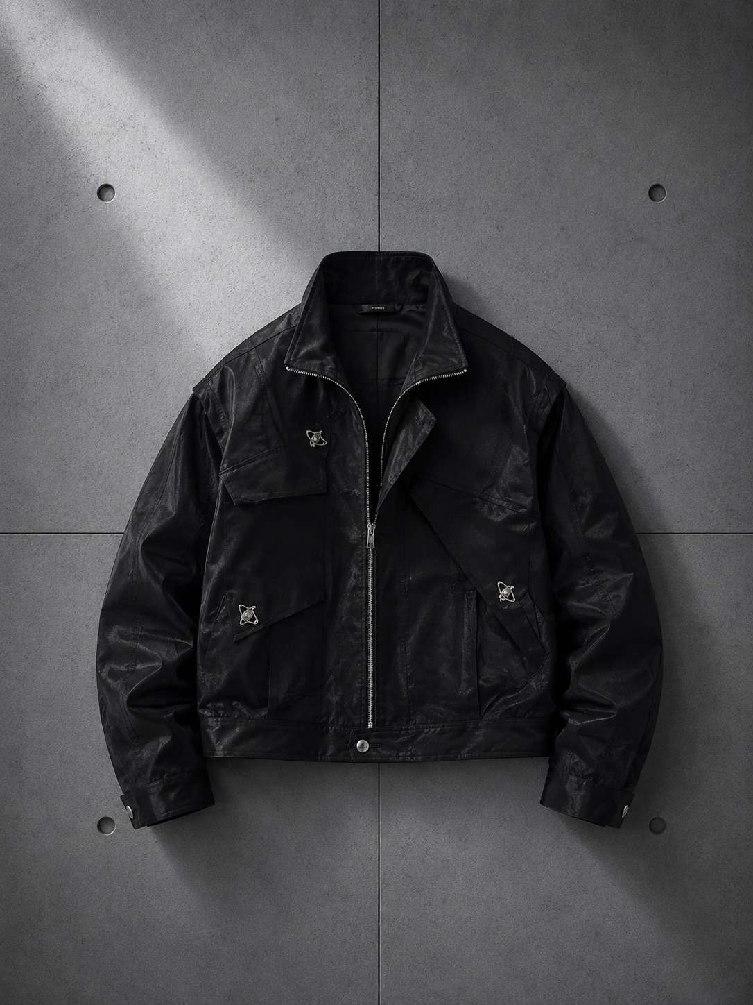 Black jacket on a gray concrete wall