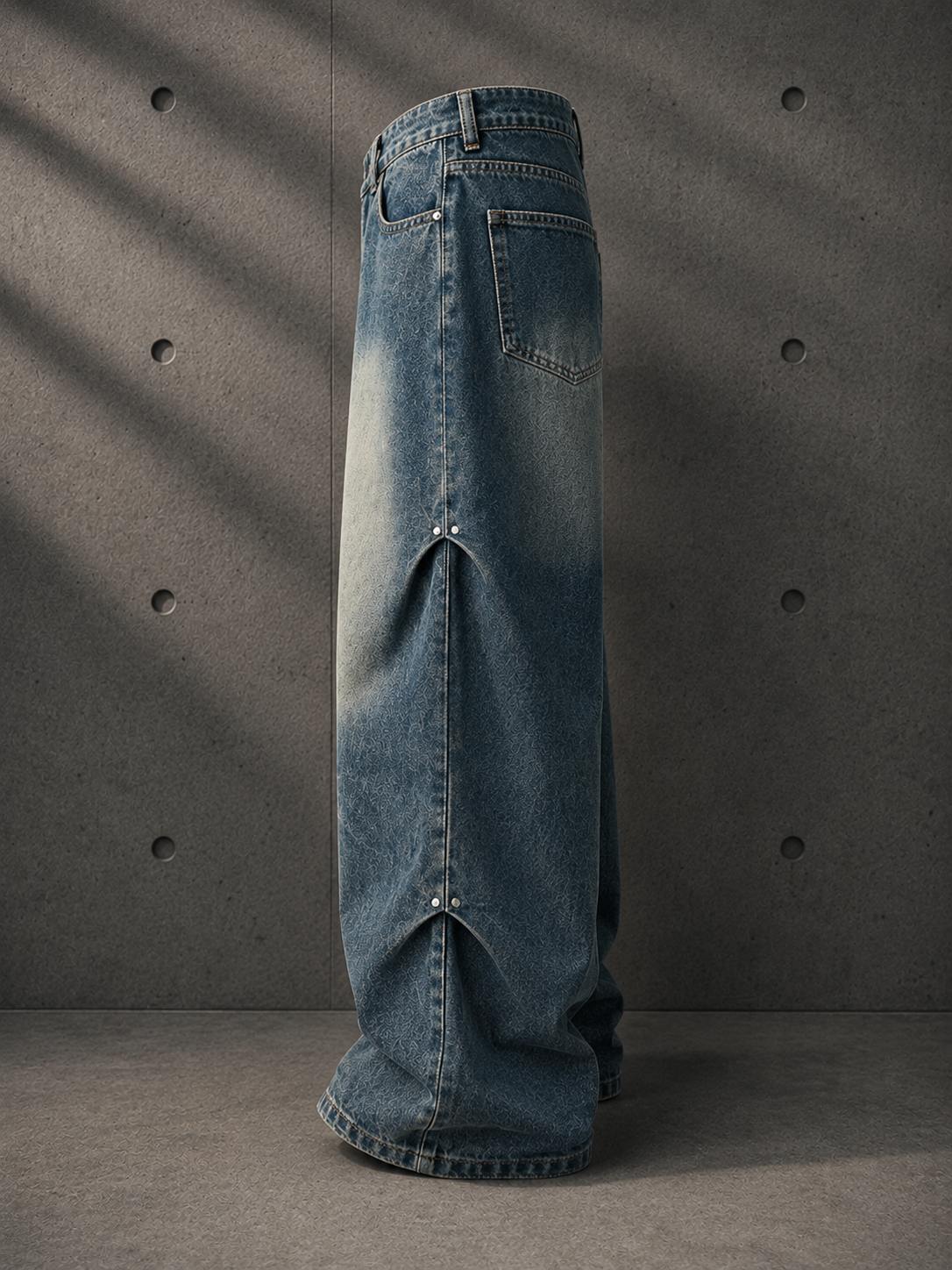 Blue denim skirt with a high slit on a gray background