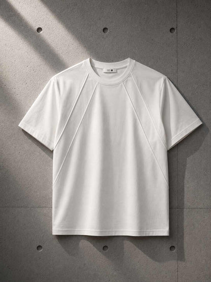 White t-shirt on a gray concrete background