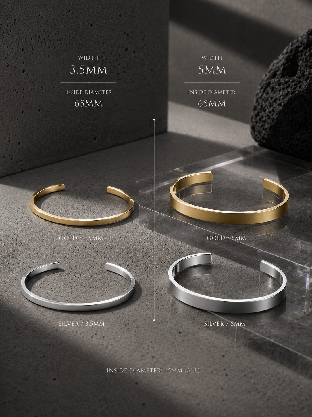 Two gold and two silver bangles on a dark surface with measurements displayed.